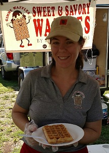Julie Geis serving up a gluten-free waffle